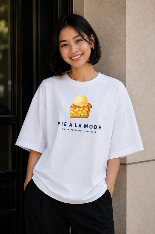 Female wearing Pie À La Mode — apple pie graphic on premium oversized white T-shirt by BonAppaTee