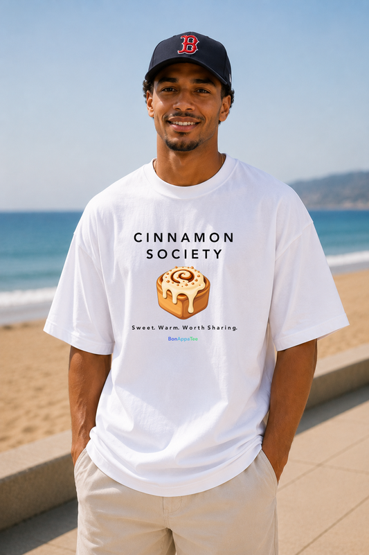 Male wearing Cinnamon Society Tee — cinnamon bun graphic on premium oversized white T-shirt by BonAppaTee