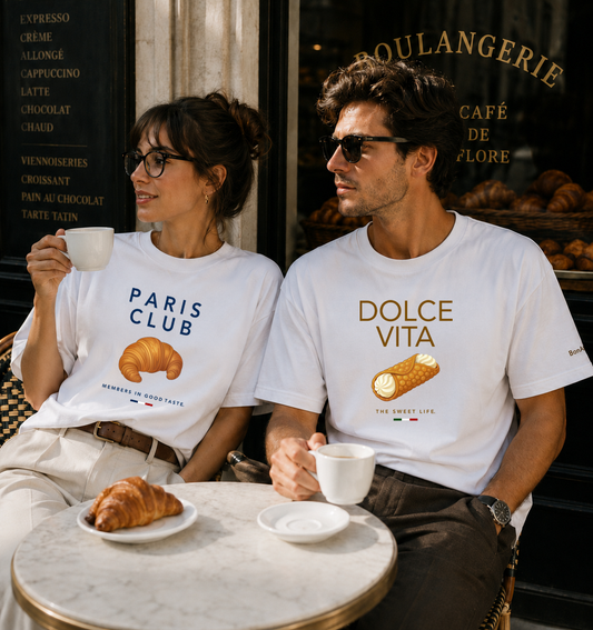 Female and male at a Parisian café wearing BonAppaTee food graphic T-shirts — Dolce Vita and Paris Club by BonAppaTee