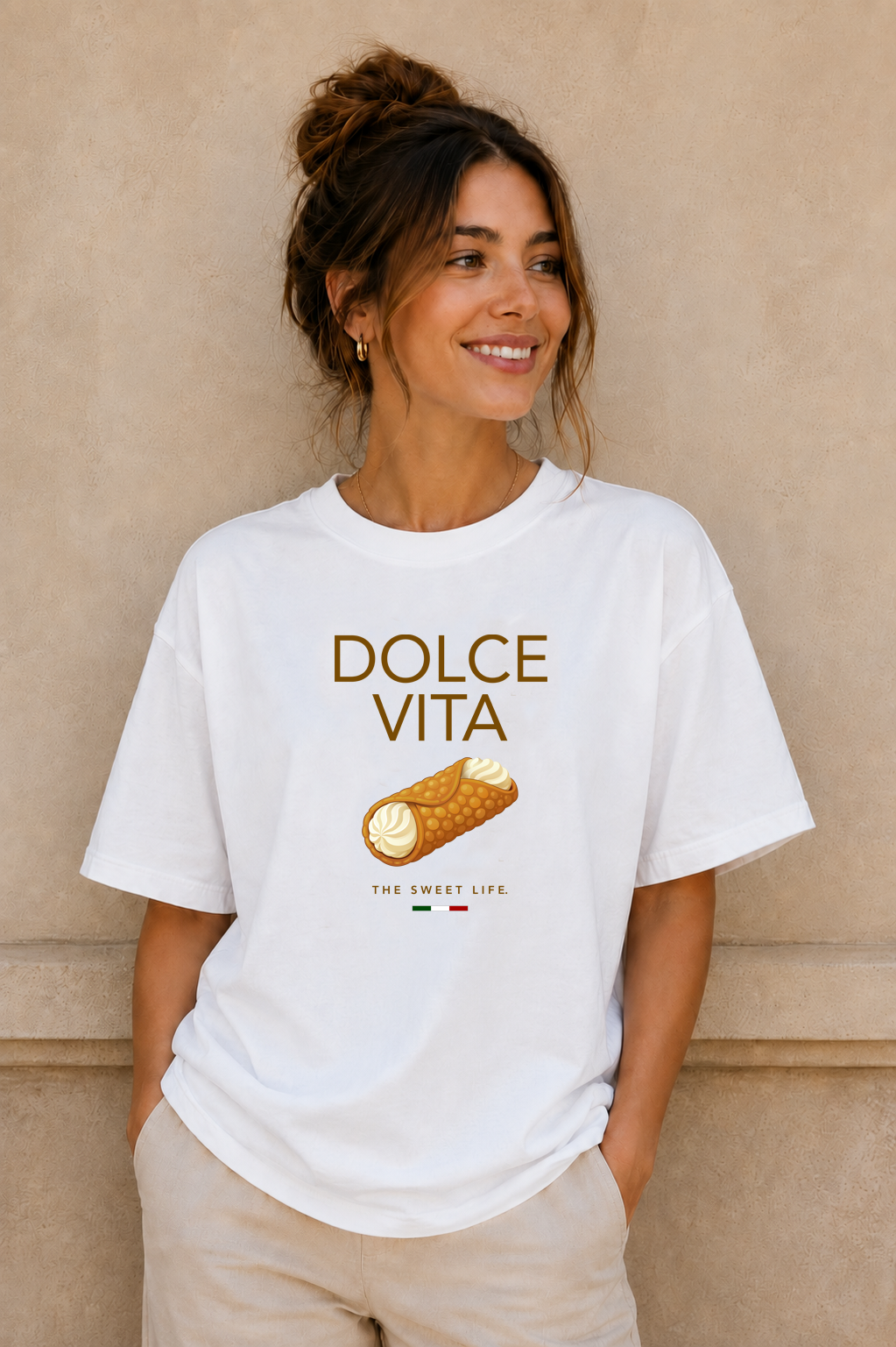 Female wearing Dolce Vita Tee — oversized fit cannoli graphic t-shirt by BonAppaTee