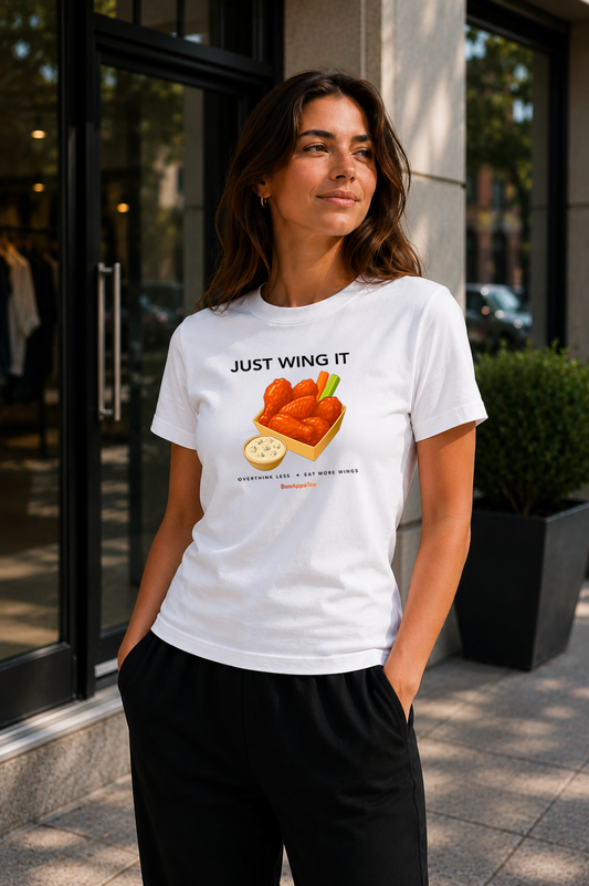 Female wearing Just Wing It — buffalo wings graphic on premium relaxed fit white T-shirt by BonAppaTee
