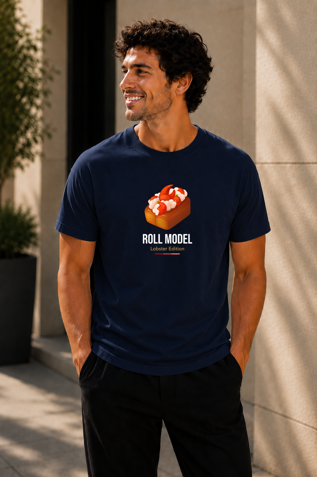 Male wearing Roll Model Lobster Edition Tee — lobster graphic on premium relaxed fit navy T-shirt by BonAppaTee