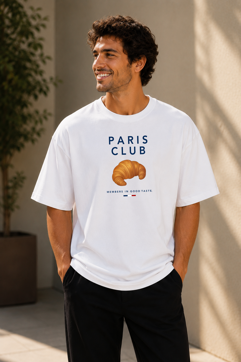 Male wearing the Paris Club Tee — oversized croissant graphic t-shirt | BonAppaTee
