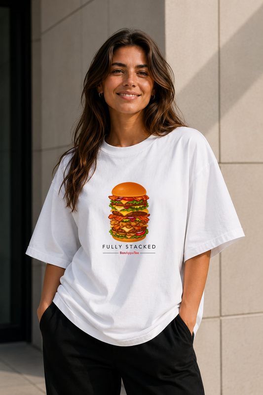 Female wearing Fully Stacked Tee — burger graphic on premium oversized white T-shirt by BonAppaTee
