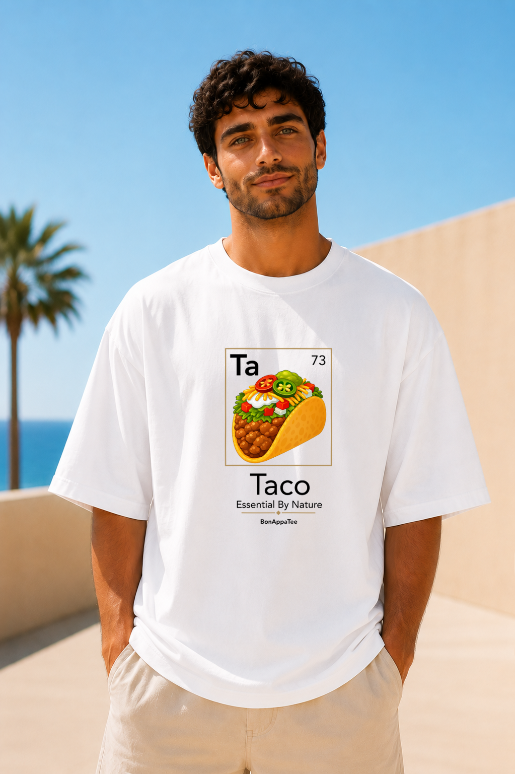 Male wearing Taco Essential By Nature Tee — taco graphic on premium oversized white T-shirt by BonAppaTee